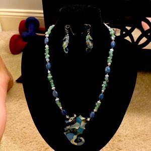 Lee Sands inlay she’ll necklace and earrings.